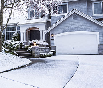 Snow Safety: Prevent Ice Dams & Carry Homeowners Insurance